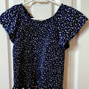 A blue flower print top.